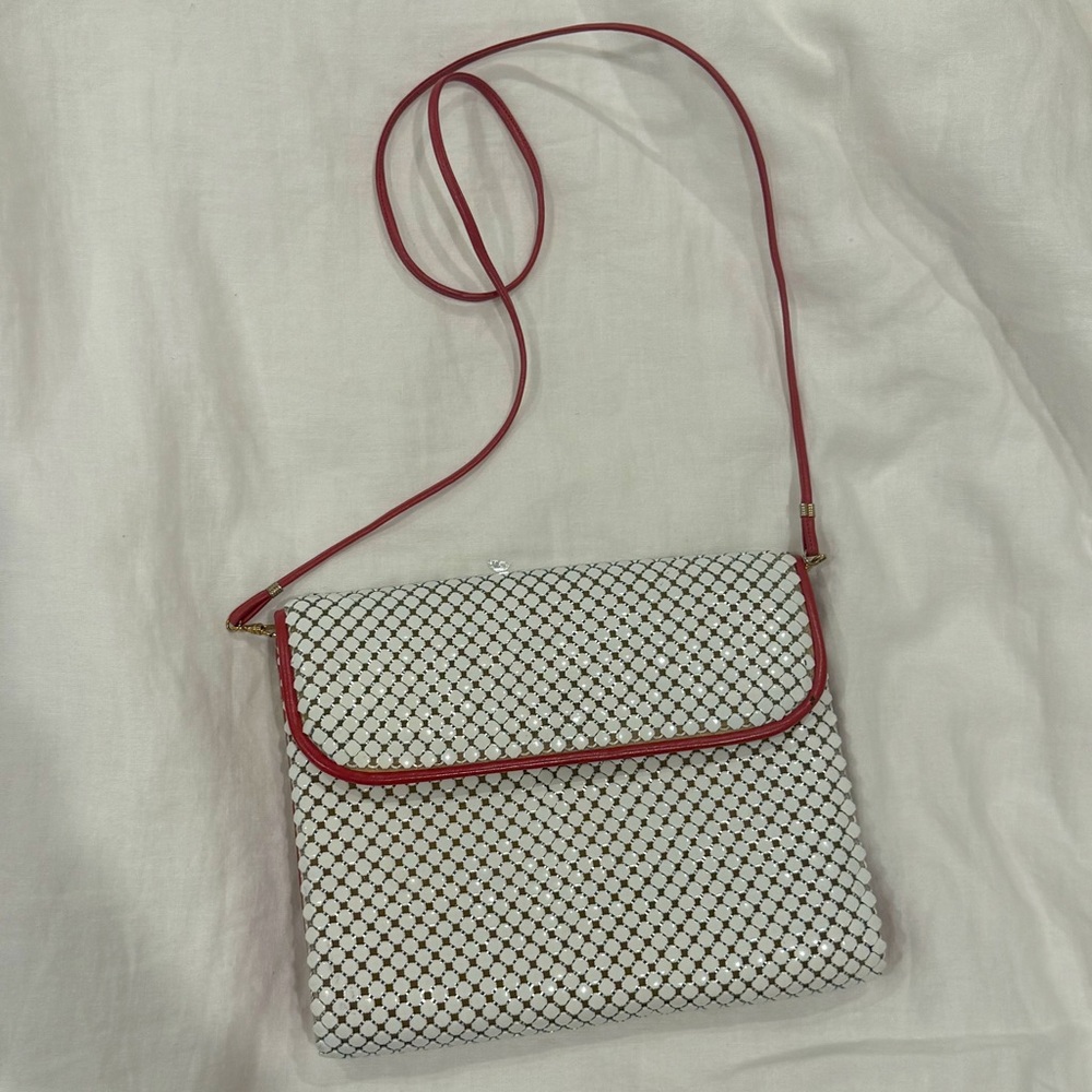 Vintage Whiting & Davis handbag. White metal mesh with red trim. Circa 1960.